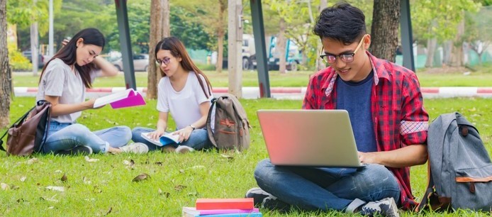 Student. studying English in a park